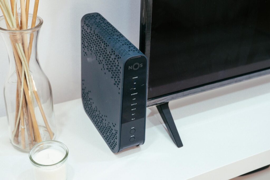 Modern Wi-Fi router on a home office desk