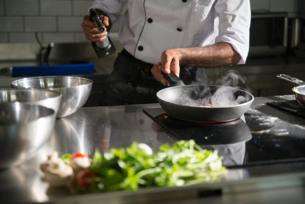 Fresh meal kit ingredients laid out on a kitchen worktop