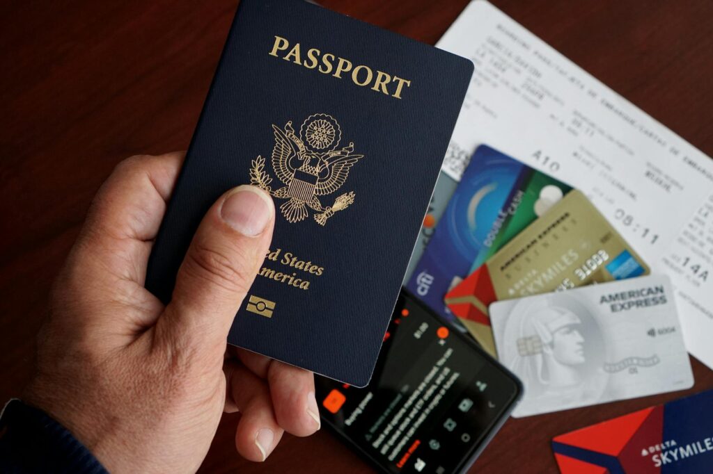 Travel money cards laid out with a UK passport