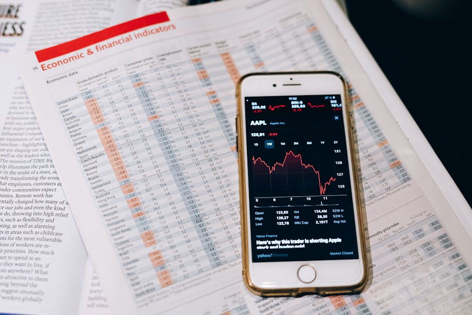 Investor reviewing stock portfolio on a phone