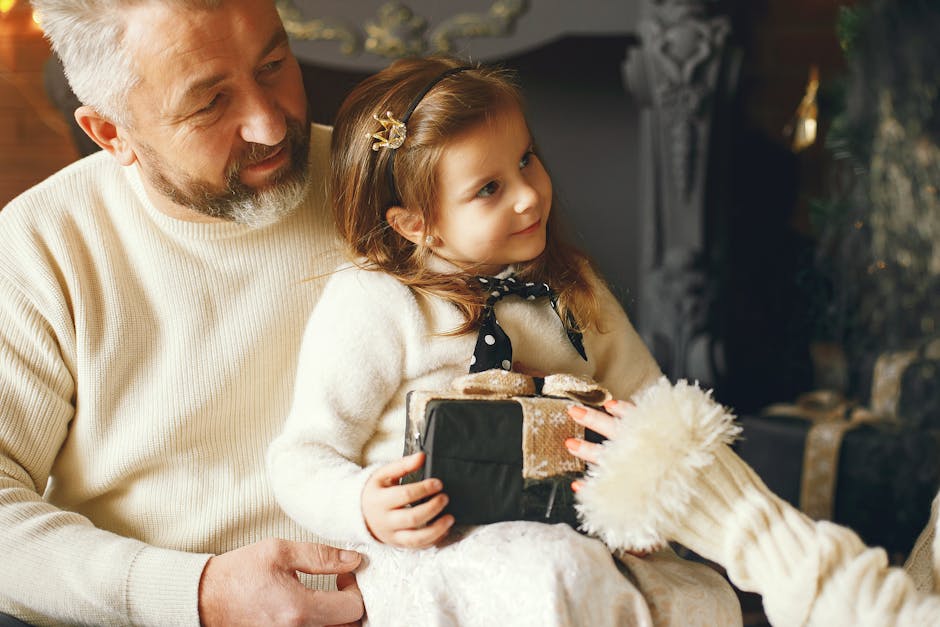 UK father opening a Father's Day gift with his family in 2026
