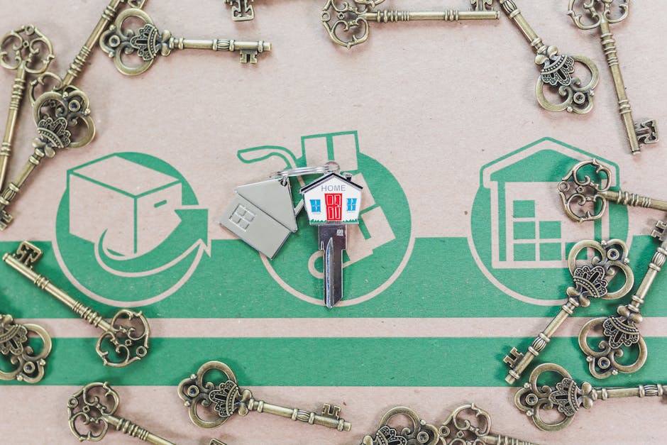 Couple holding house keys outside their first home — UK first-time buyer
