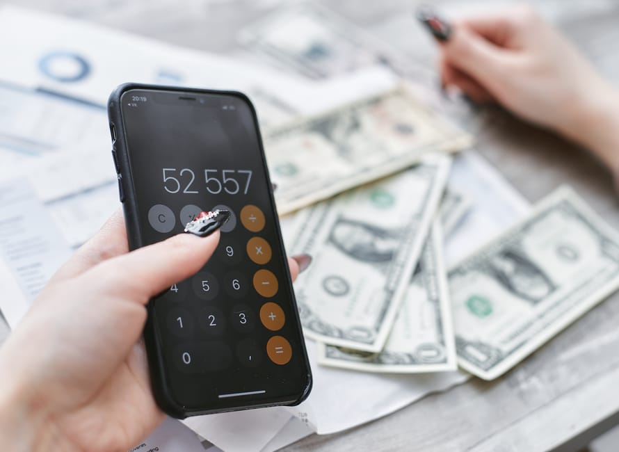 UK consumer reviewing a mobile phone bill with mid-contract price rise notice