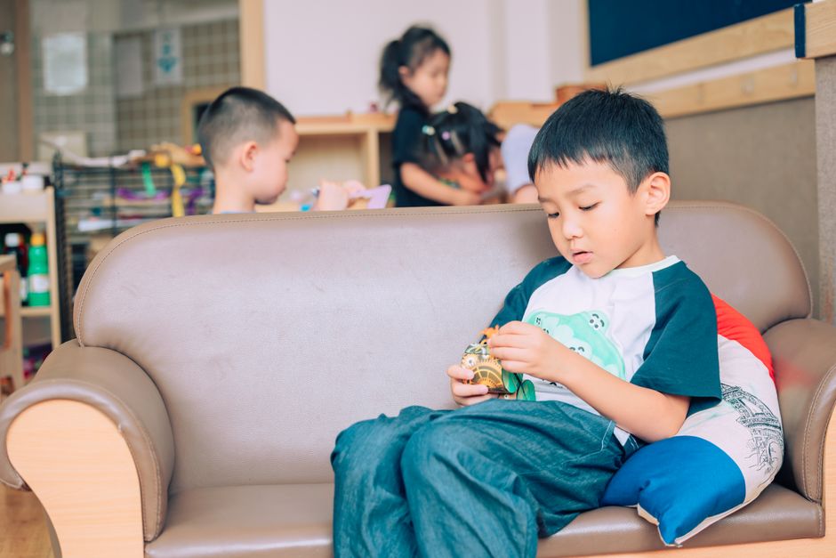 UK working parent dropping child at nursery to use Tax-Free Childcare