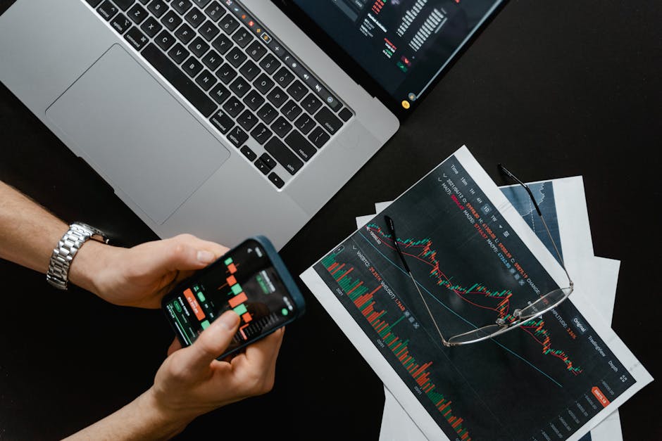 Investor reviewing stock portfolio on a phone
