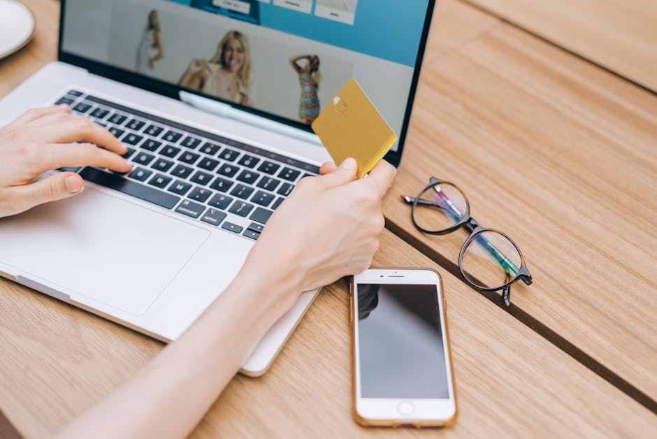 Person paying for an online purchase in instalments on a smartphone