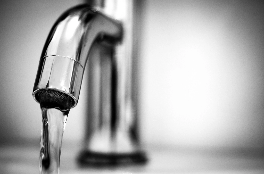 Water running from a kitchen tap, representing rising UK water bills in 2026